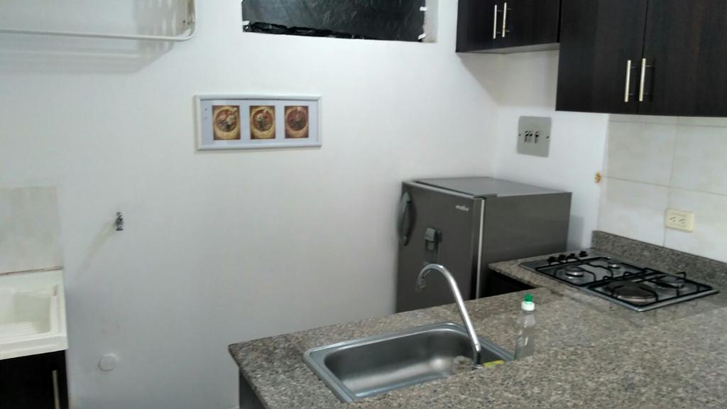 Arco Apartasuites Cali Bagian luar foto