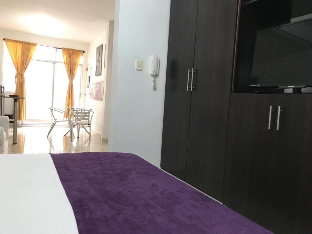 Arco Apartasuites Cali Bagian luar foto