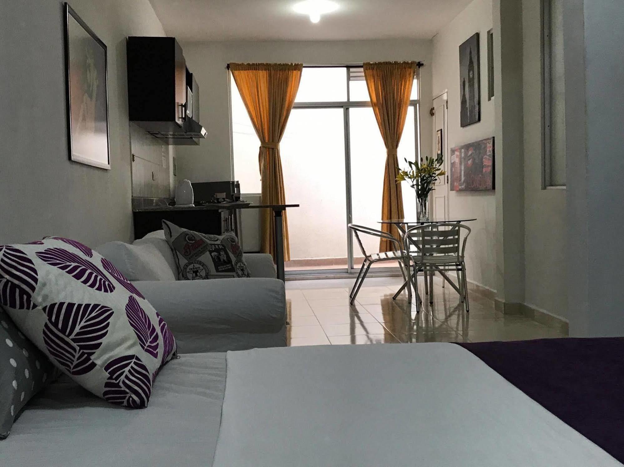 Arco Apartasuites Cali Bagian luar foto