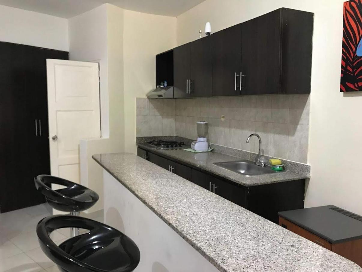 Arco Apartasuites Cali Bagian luar foto